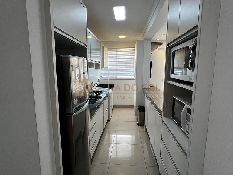 Apartamento com piscina e vista mar para alugar em Bombinhas